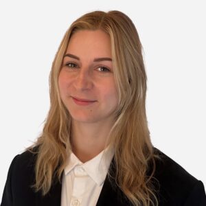 Stephanie Bean, Marketing Leader, with long blonde hair, smiling in a dark suit and white shirt.